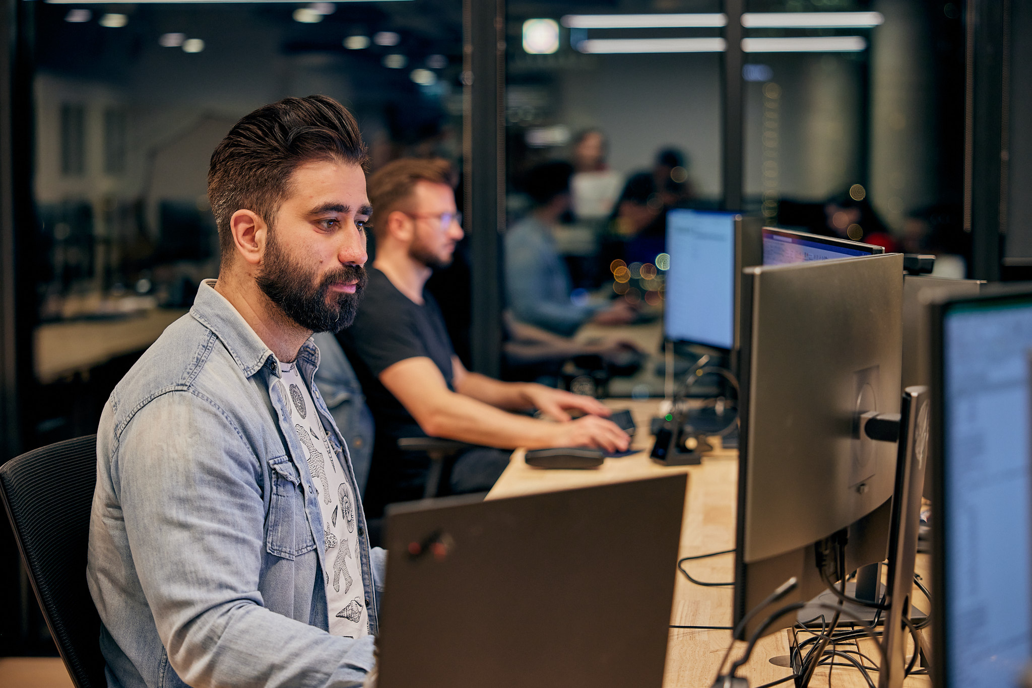 two people working at desk