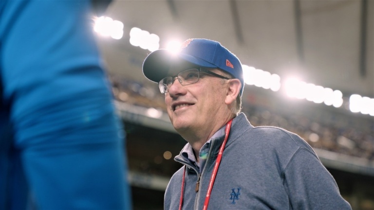 Steve Cohen at baseball stadium in Japan