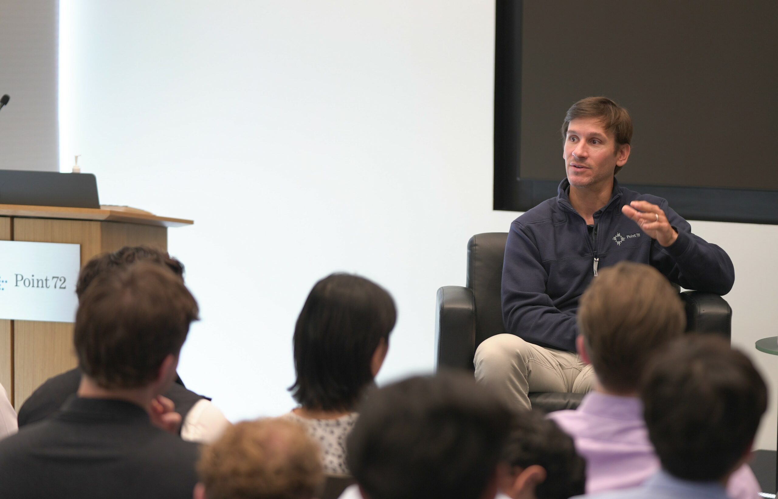 Man speaking to students