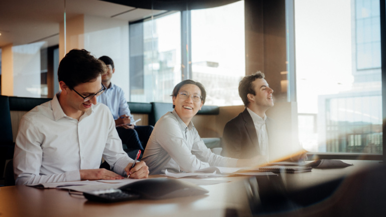 point72 interns at office conference table