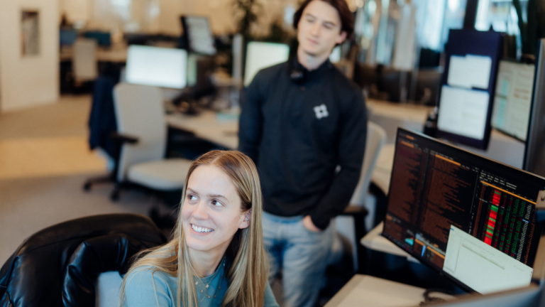 Academy analyst working at desktop computer