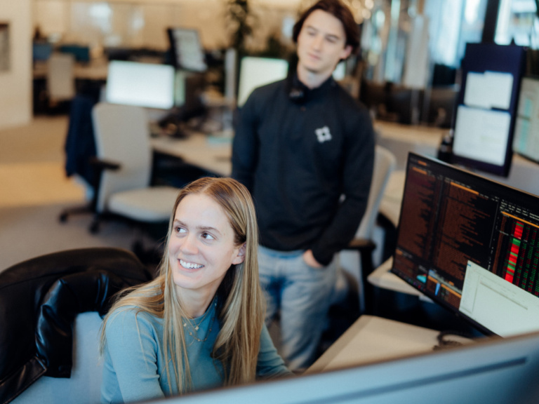 Academy analyst working at desktop computer