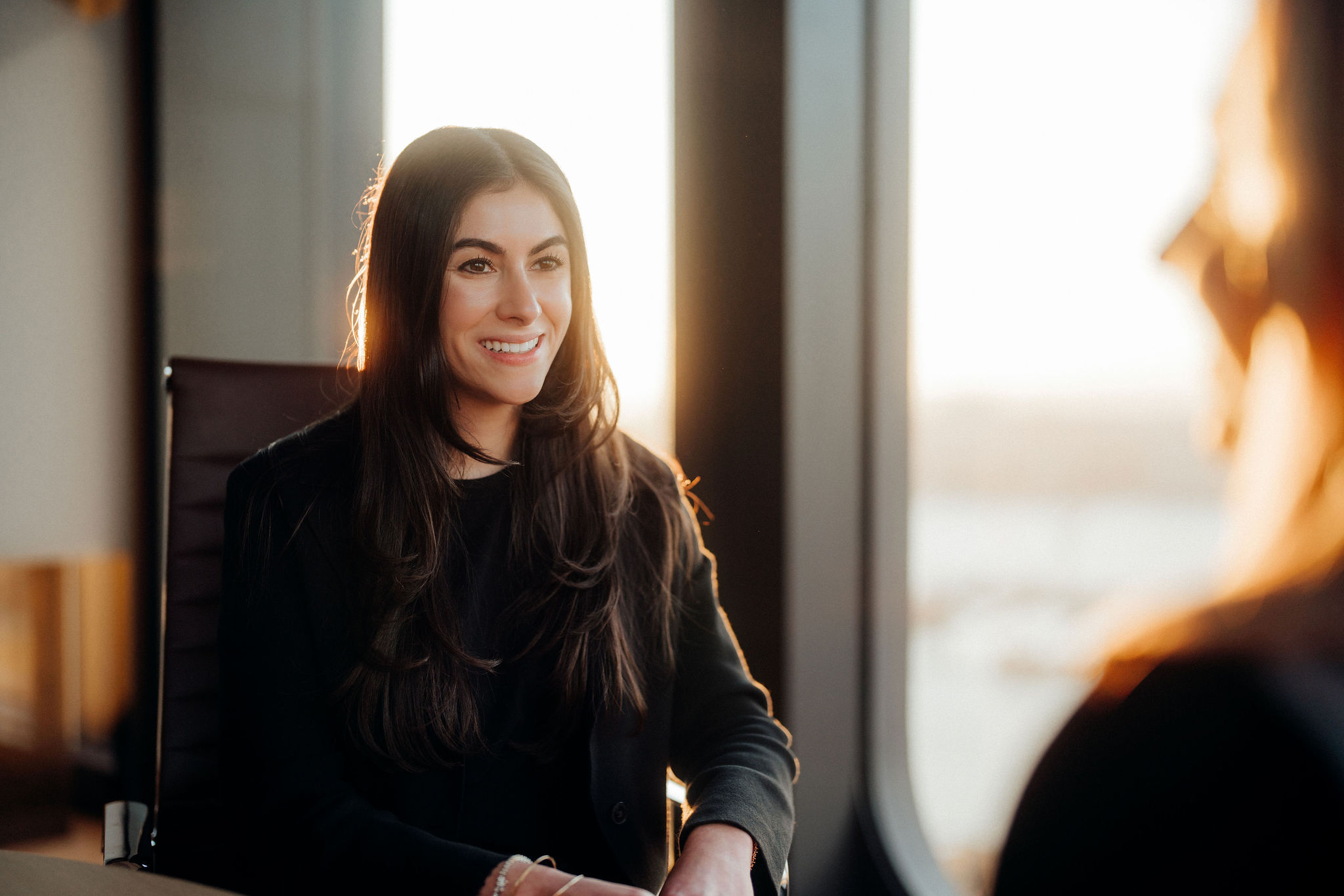 Photo of person sitting in a conference room