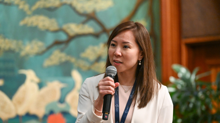 Photo of Sonia Yu speaking