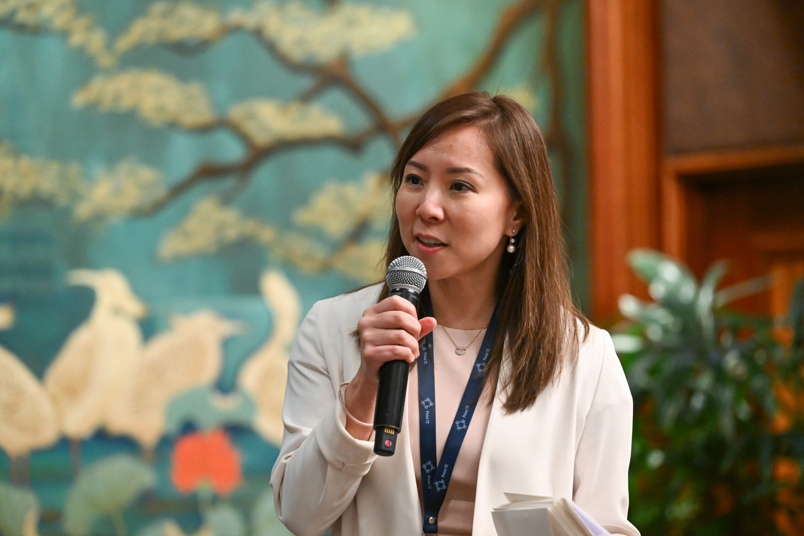 Photo of Sonia Yu speaking