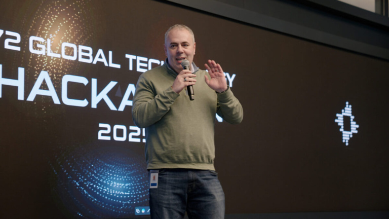 Photo of Ilya speaking