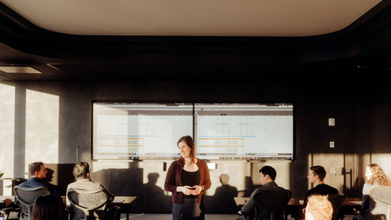 Jaimi Goodfriend speaking to Point72 Academy Assocaites