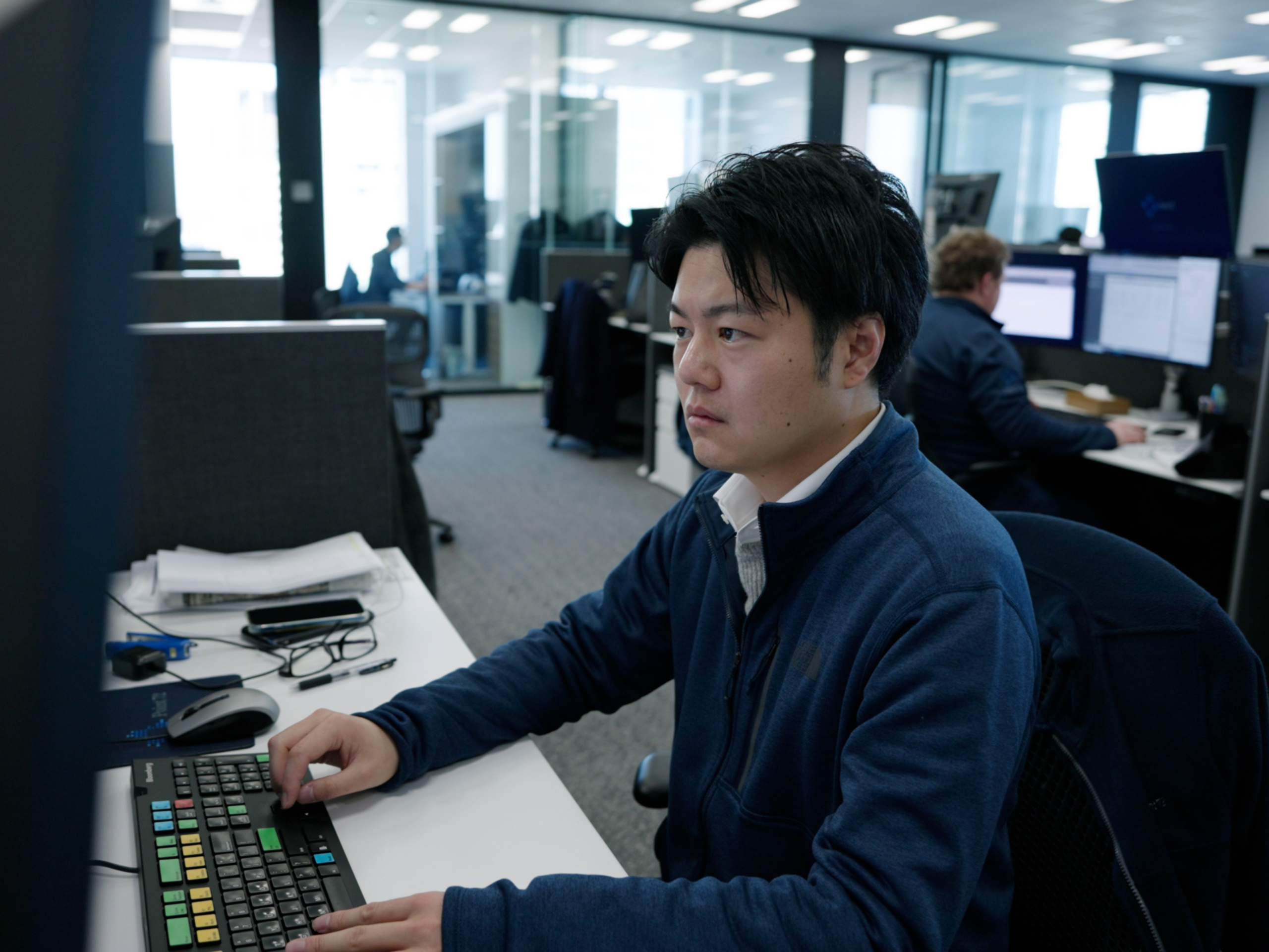 Photo of analyst at desk